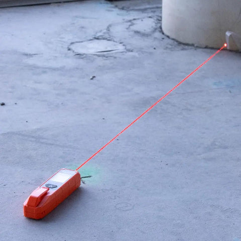 Orange Super Handy Laser Distance Measure That Runs From 2 Inches To 100 Feet With Sharp Precision Reads Feet Inches And Meters