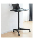 Legit Foldable Rolling Laptop Workstation With Slick Height Adjustment For Sofa Bed Or Outdoor Vibes with sleek black design and wheels.