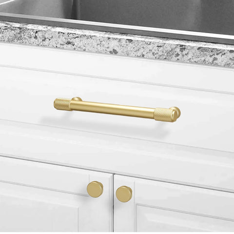 10 Pack Brushed Brass Kitchen Cabinet Knobs With Knurled Texture Gold Drawer Knobs installed on white kitchen drawers