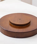 12 Inch Bamboo Lazy Susan Turntable For Kitchen Pantries Delivers Slick 360 Spin To Keep Condiments Grabbed Instantly on a white surface.