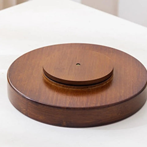 12 Inch Bamboo Lazy Susan Turntable For Kitchen Pantries Delivers Slick 360 Spin To Keep Condiments Grabbed Instantly on a white surface.