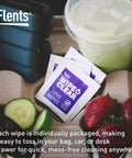 Flents lens wipes sachets, individually wrapped for travel, purple-labeled packets, front view