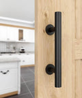 12 Inch Sliding Barn Door Handles Hardware With Flush Finger Pull installed on wooden door, showing black finish and smooth edges.