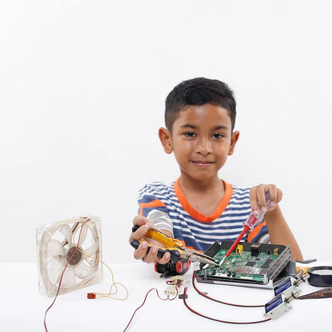 TEHAUX 12V mini push-pull solenoid electromagnet on a circuit board; child assembling electronics with tools
