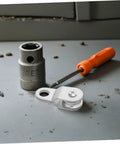 Twelve Piece 6mm Rope Guide Pulley Blocks For Outdoor Use With Swivel Cable Lifting Rollers, shown with white pulley and tool