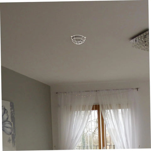 Premium Stainless Steel Fire Sprinkler Head Deflector on ceiling, protecting fixture in home setting with white curtains.