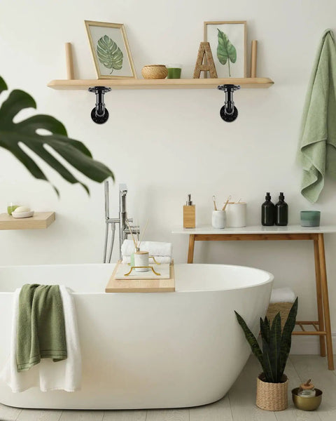 White bathroom with shelf supported by Built Tough Pipe Shelf Brackets Set 4 Pack Black L Shaped Iron Shelving Brackets.