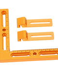 Top Tier CNC Positioning Fixture Kit With Sleek Vise Clamps And Smooth Side Clamping, orange aluminum square with clamps.