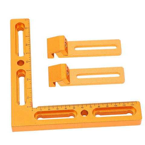 Rock Solid Cnc Workpiece Positioning Fixture Kit For T Slot And Perforated Tables With Side Clamping Vise Dead Nuts in orange aluminum.