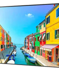 55 Inch Commercial Digital Signage Display With Killer 2500 Nits Brightness And Straight Up Crisp Full HD 1080p LED Screen showcasing colorful waterfront buildings.