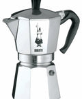Moka Express Stovetop Espresso Maker For Real Italian Coffee Nine Cup Moka Pot In Aluminum Silver, front view, classic design.