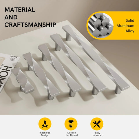 Solid aluminum alloy cabinet handles displayed on a surface, highlighting material and craftsmanship.