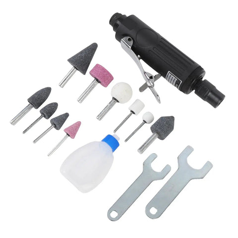 Real Deal Pneumatic Die Grinder Kit With Quarter Inch Chuck aluminum die grinder with accessories including grinding heads and wrenches.