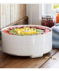 Heavy Duty Electric Food Dehydrator With Adjustable Temperature Controls For Rapid Jerky Fruit Vegetables And Pet Treats, stacked trays with fruit.