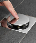 Ridiculously Durable Chrome Plated Brass Pop Up Floor Drain Plug For Bathtubs And Showers Slick Push Valve being pressed