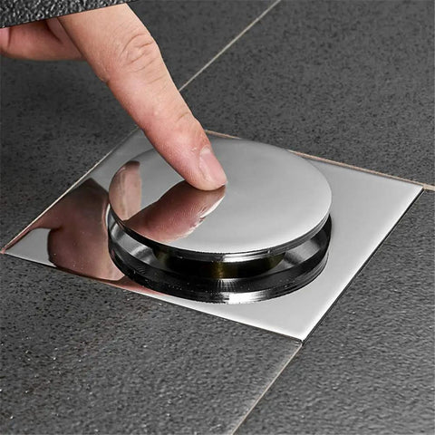 Ridiculously Durable Chrome Plated Brass Pop Up Floor Drain Plug For Bathtubs And Showers Slick Push Valve being pressed
