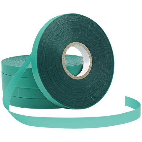 Green Plant Tie Tape Rolls 6 Mil Thick Half Inch Wide 200 Feet Each For Large Tapeners And Tie Guns, stack of green rolls