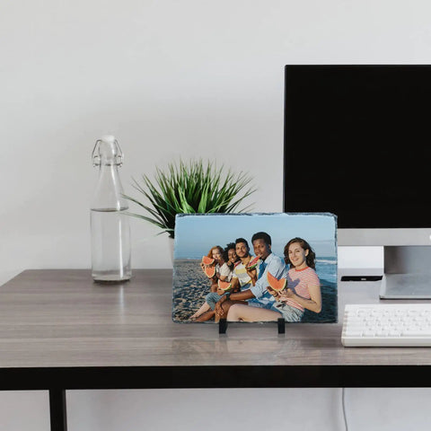 Two Pack 11.46x7.48 Inch Rectangle Sublimation Slate Frames with Stand displaying family beach photo on desk