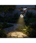 Ultra Bright Solar Motion Light Outdoor Waterproof Security Spotlight Motion Activated With Flexible Tripod Aluminum Floodlight illuminating a garden path