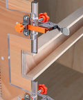 Dead Nuts Precise Embedded Handle Slotting Template With Quick Clamp And Router Dust Cover For Wardrobe Cabinet Door Panel U Groove Positioning Jig, showing the clamp and scale on a wooden cabinet.