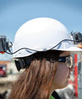 Side view of person wearing hard hat with Rechargeable Portable Cooling Turbo Fan For Hard Hats And Safety Helmets Quiet 3-Speed