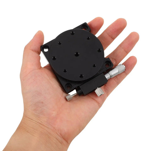 60Mm Manual Precision Rotation Stage Aluminum Platform R Shaft shown in hand, sleek design for optical alignment.