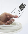 Hand inserting tube into 5/16 Push To Connect Ball Valve Union For Pneumatic Air Lines Quick Connect Fittings Set No Tools Required Easy Snap In Installation 5 Pack Durable Brass Body Leak Free For Air Compressors And Pneumatic Systems.