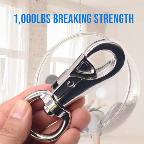 Person holding Beefy 1000Lb Swivel Hook for Hanging Chairs and Hammocks, 360 Degree Snap Action, with hanging chair in background