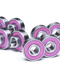 Set of high speed longboard bearings for performance riding, chromium steel, rubberized shields for smooth rolling, inner step ring.