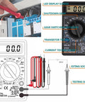 Digital multimeter DT832 with LED display, test leads, and labels for gear switching, testing sockets, and transistor testing