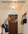 Heavy Duty Motion Sensor Led Ceiling Light 6 Inch 16W 1000 Lumen adjustable timer display in hallway setting.