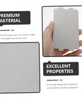 Person holding a Mica Plate Insulation Sheet for Microwave Oven Heat Resistant Kitchen Mats, highlighting premium material and properties.