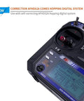 Close-up of Flysky FS-i6 6CH 2.4GHz AFHDS 2A RC Transmitter with display and controls.