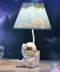 Golden Astronaut Kids Table Lamp With Barrel Lampshade, 13 Inch Spaceman Bedside Table Lamp on desk with space theme