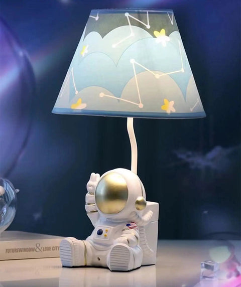 Golden Astronaut Kids Table Lamp With Barrel Lampshade, 13 Inch Spaceman Bedside Table Lamp on desk with space theme