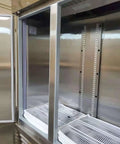 Inside view of Rock Solid 82 Inch Wide Commercial Reach In Freezer With Three Doors And 72 Cubic Feet Capacity Stainless Steel.