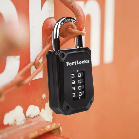 Gym Locker Lock With 4 Digit Combination, Tough As Nails Padlock, Hardened Stainless Steel attached to a metal gate, black.
