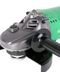 Close-up of a powerful 7-inch angle grinder with 15 amp motor, 2500W capacity, showcasing its rugged and lightweight design.