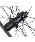 Close-up of the hub and spokes on a 700C Carbon Disc Wheelset 38mm Clincher Road Bike Wheels Centerlock With Sapim Spokes