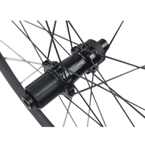 Close-up of the hub and spokes on a 700C Carbon Disc Wheelset 38mm Clincher Road Bike Wheels Centerlock With Sapim Spokes