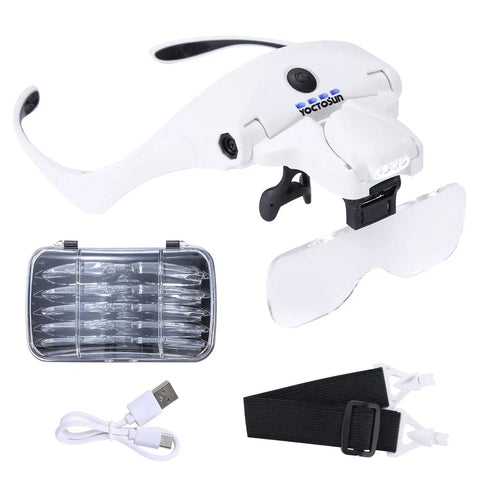 Rechargeable LED Headband Magnifier With Four Bright Lights And Five Detachable Lenses From 1X To 3.5X For Crafts Cross Stitch And Hobby Projects Hands Free showing lenses, USB cable, and strap.