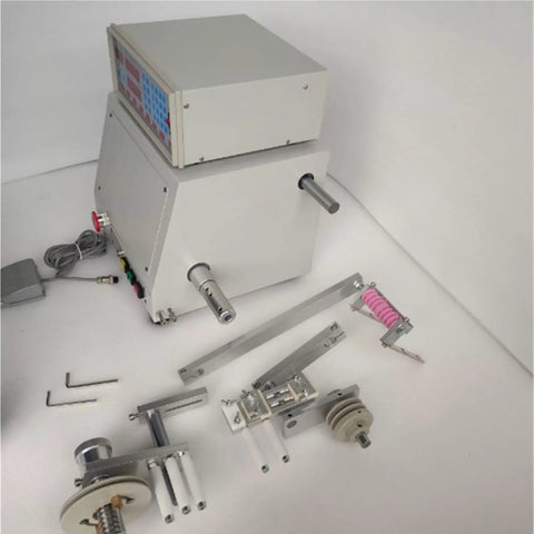 Built Tough Automatic Cable Winder Reel Zero Drama Cord Management Workhorse For Workshop Plus Garage with multiple components displayed.
