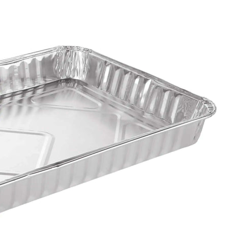 Close-up of 50 Pack Half Size Aluminum Pans Disposable Cookie Sheets Nonstick Baking Trays Foil Pans 12.7 by 7.9 inches