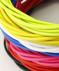 Colorful cables from All In One Bike Cable Kit For Mountain And Road Bikes With Brake And Derailleur Housings Routing Damping Foam