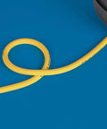 Retractable Air Tool Hose Reel With Polypropylene Case And Three Eighth Inch By Fifty Foot Premium Hybrid Polymer Hose close-up on blue background