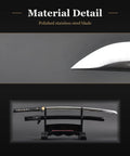Close-up of unsharpened stainless steel blade on Iaido training sword, showing detailed material and polished finish.