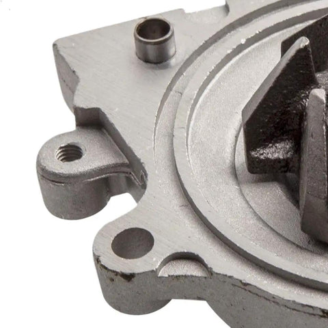 Thinking Process: silver metal water pump housing with mounting holes and shaft opening for Integra timing belt set