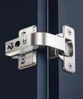 Close-up of 90 Degree Lazy Susan Pie Cut Cabinet Hinge 2 Pack For Corner Bifold Doors in zinc cast installed on cabinet door.