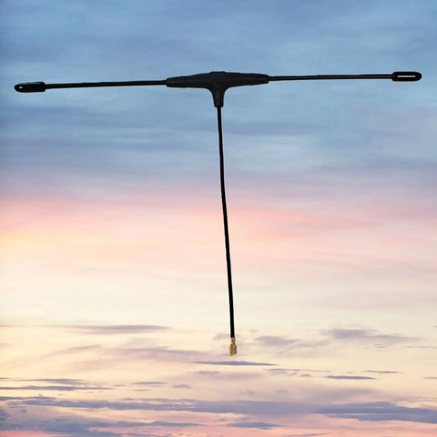915MHz FPV Antenna 90mm ELRS Ready For EP1 RX IPEX1 Compatible With TBS Tracer RC FPV Drone Part against sunset sky
