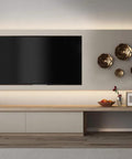 Modern living room setup with wall-mounted TV and accent lighting using 0 To 60 Watt Max Dimming LED Driver With Enclosure For Low Voltage Lighting 12V DC Power Supply No Minimum Load Fully Dimmable ELV Compatible With Lutron And Leviton Dimmers Black Enclosure
